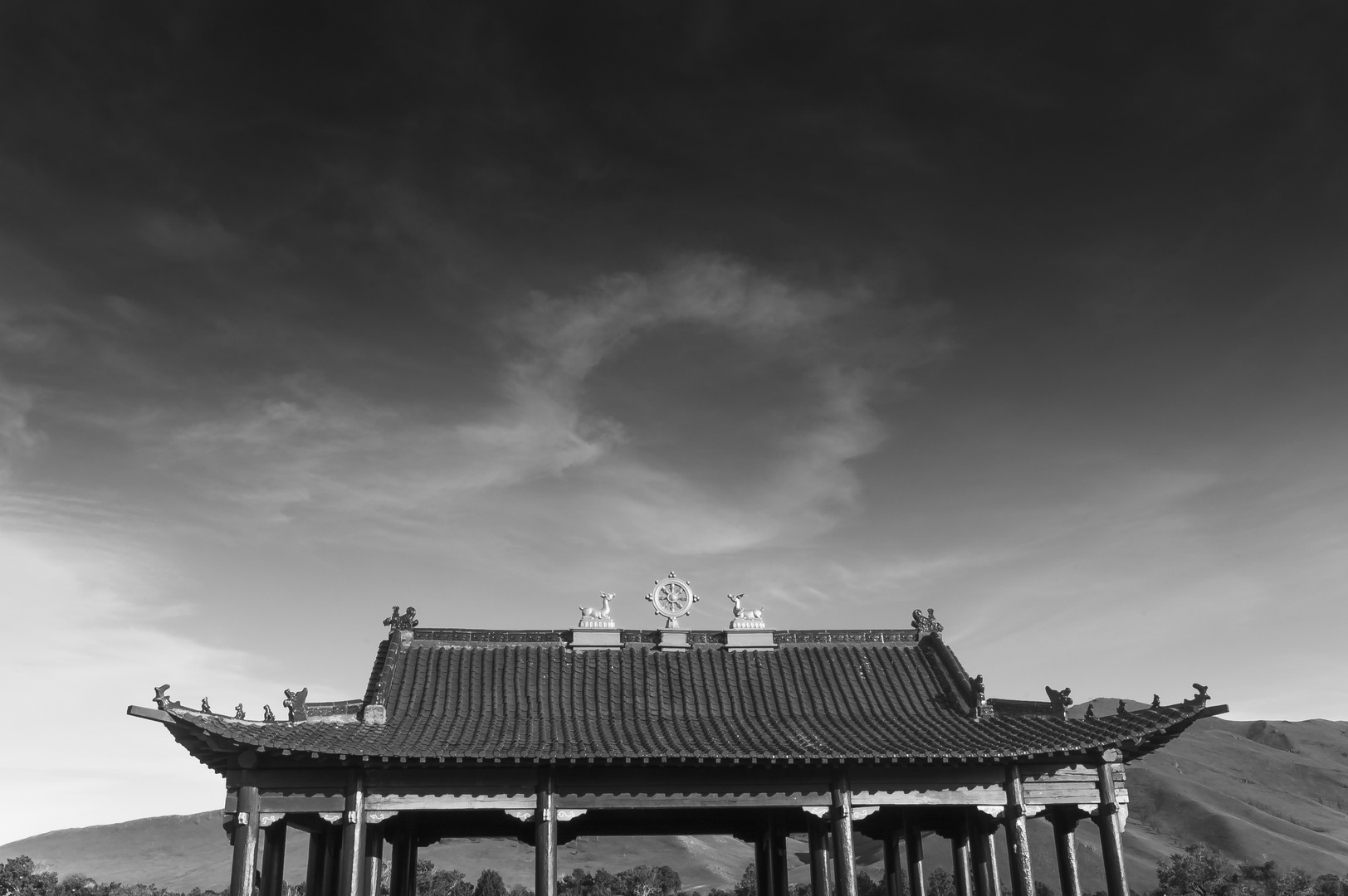 wheel of dharma and circle clouds