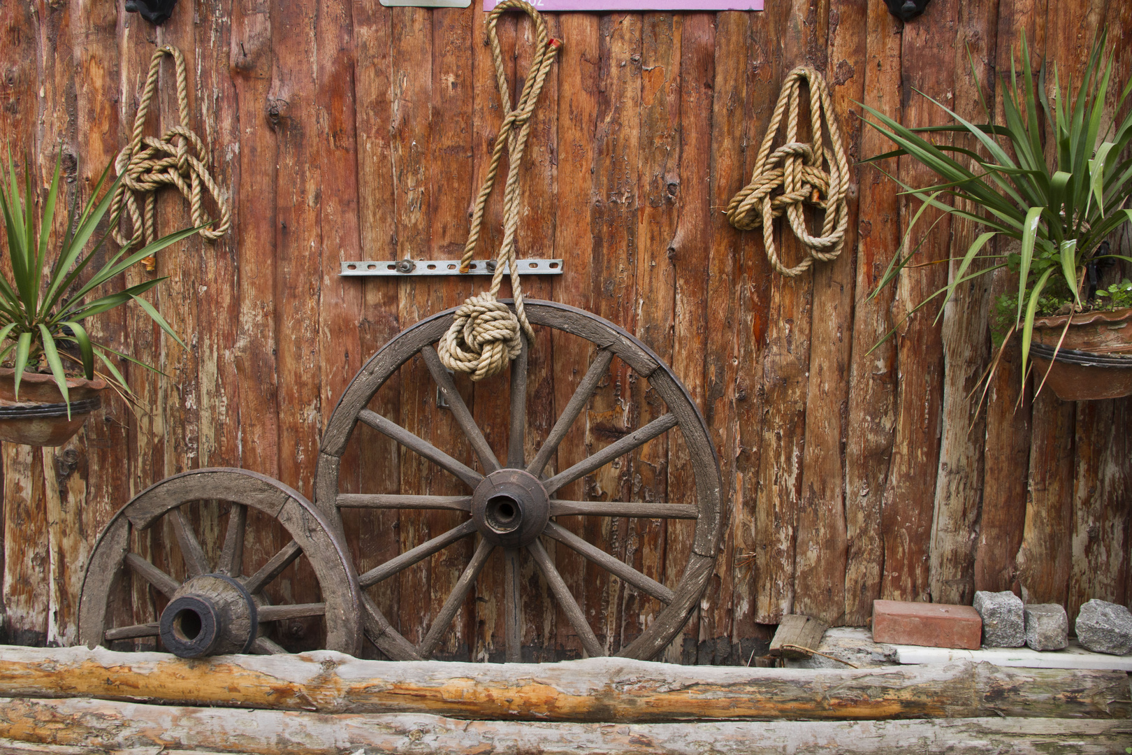 wheels of a house cart