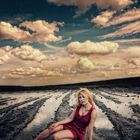white clouds red dress