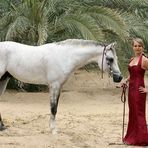 [white horse with red dressed woman]