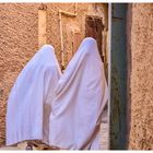 white shadows slide silently through the alleys of Ghardaia