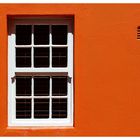 white window - orange wall