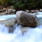 Wild River with a Stone