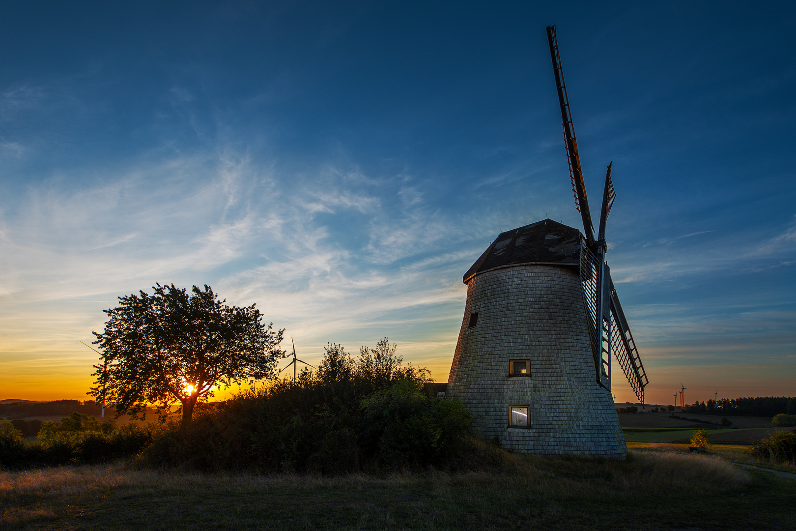 windmill in sunrise