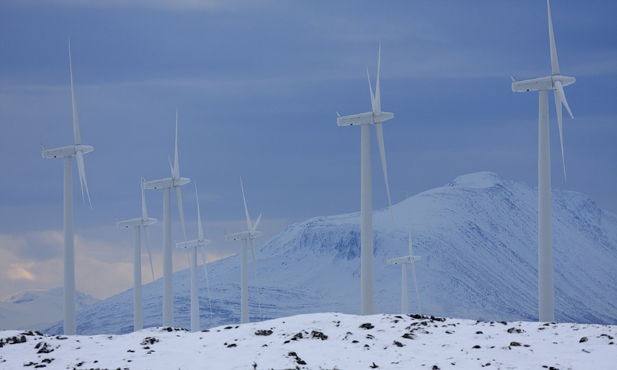 Windmills in winter landscape