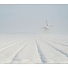 windmühle im schnee