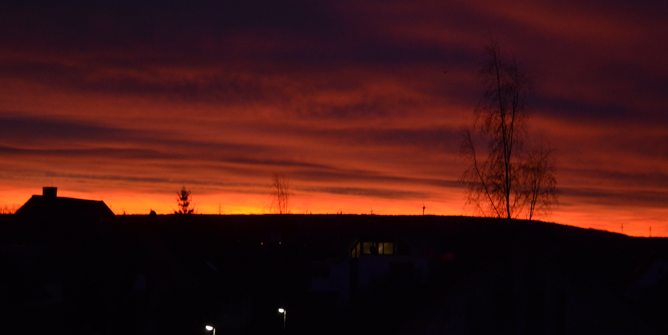 Windmühlen am Horizont Sonnenaufgang