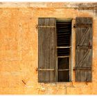 window on ochre wall