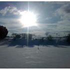 Winterlandschaft im gleißenden Sonnenlicht