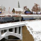 Winterlandschaft mit Altbau-schönheiten 118 025 und 119 011