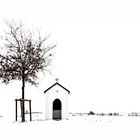 Winterlandschaft mit Kapelle