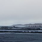 winterliche stimmung am strand vor kampen