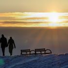 Winterlicher Spaziergang in Sonnenuntergang