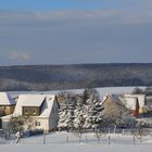 Winterliches Eichsfeld - Blick auf Kalteneber im Sonnenlicht