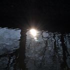 Wintersonne spiegelt sich im Wasser