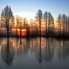 Wischeffekt bei Sonnenaufgang am Weiher