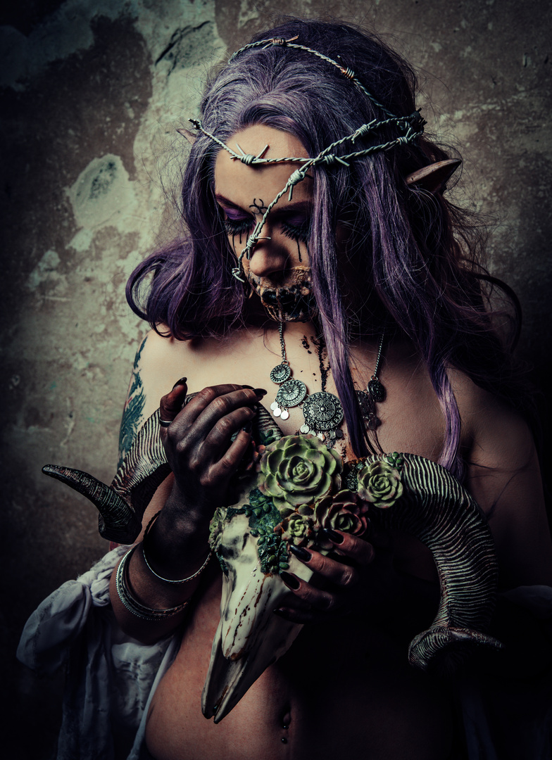 Witch with skull