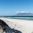 Wolke, Strand und Meer