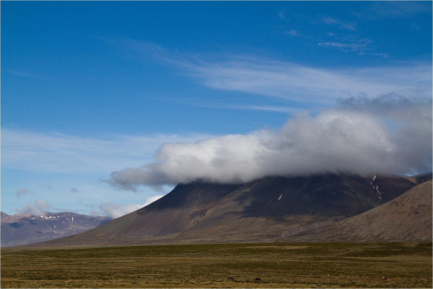 Wolken am Berg