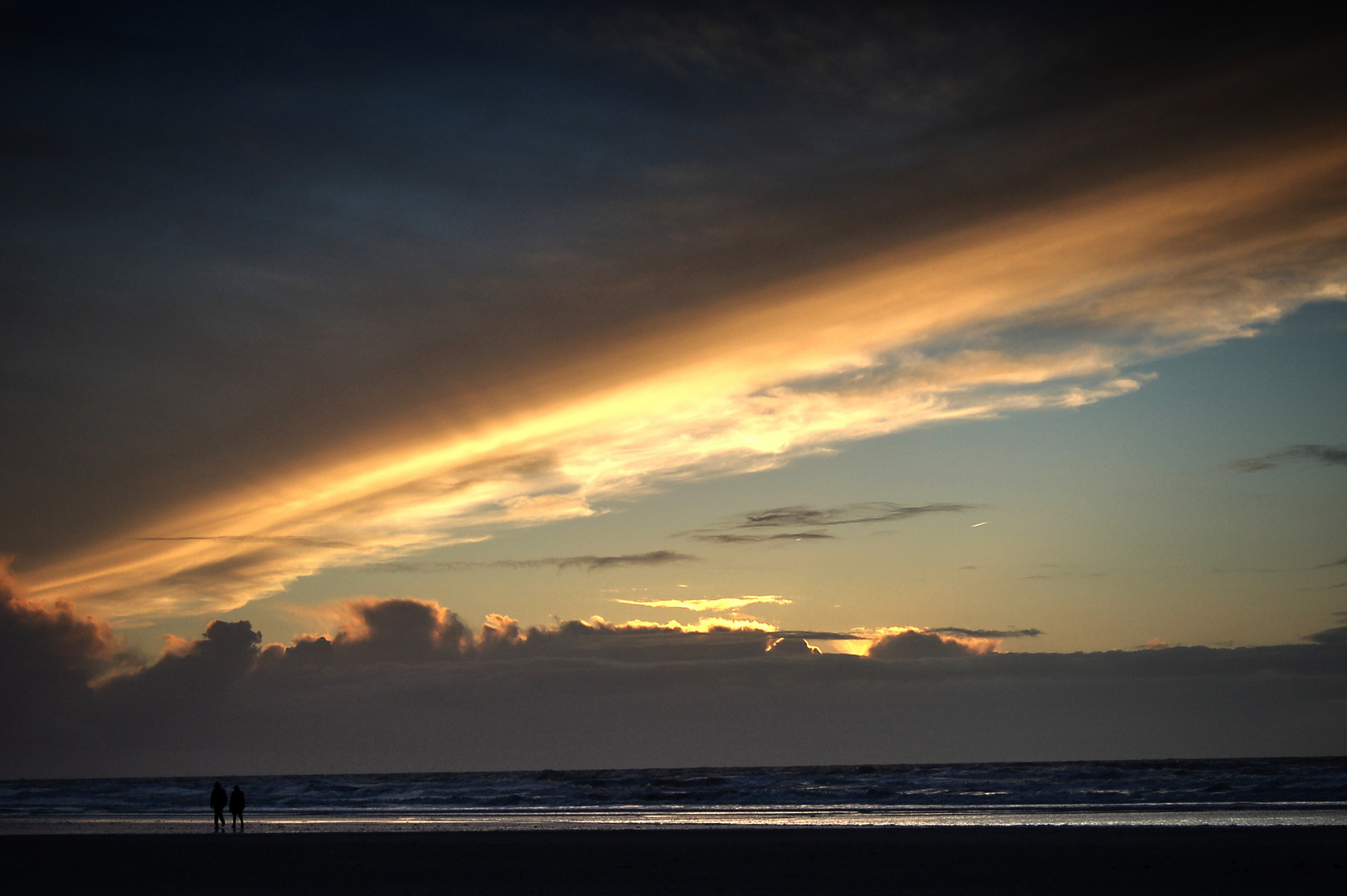 Wolken am Strand