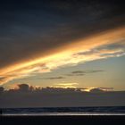 Wolken am Strand