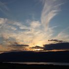 Wolken erwachen bei Sonennuntergang