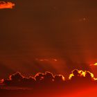 Wolken-Farben mit Sonnenstrahlen