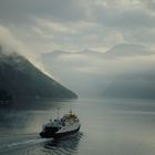 Wolken im Geiranger Fjord