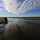 Wolken im Wasserspiegel