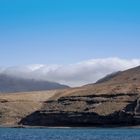 Wolken kommen über die Berge