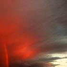 Wolken mit Regenbogen