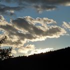 Wolken mit Sonnenuntergang