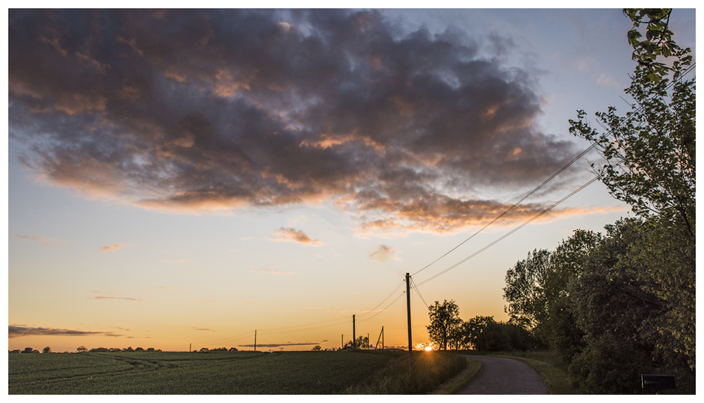 Wolken mit Sonnenuntergang