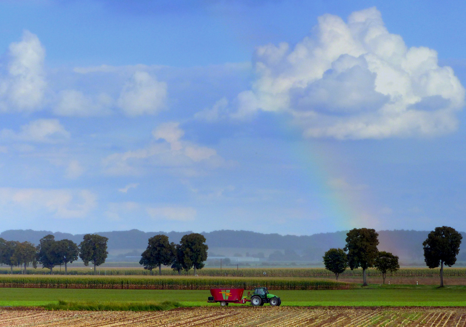 Wolken, Sonne und Regen