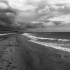 Wolken, Strand und Meer