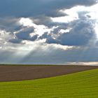 Wolken über Äckern