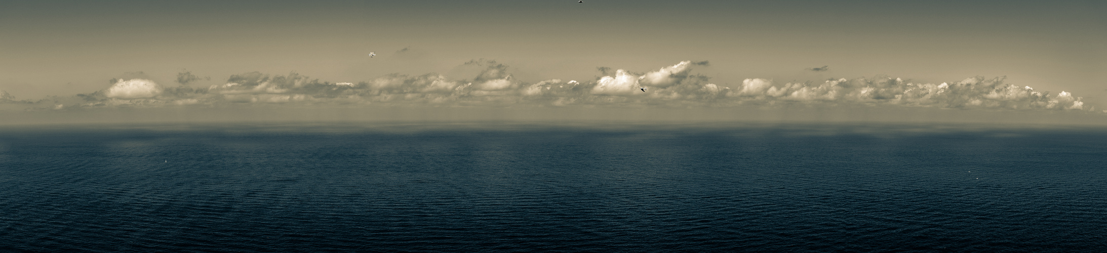 Wolken über dem Meer Panorama