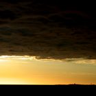 Wolken über dem Watt verdecken die Sonne