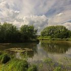 Wolken überm Wasserbecken