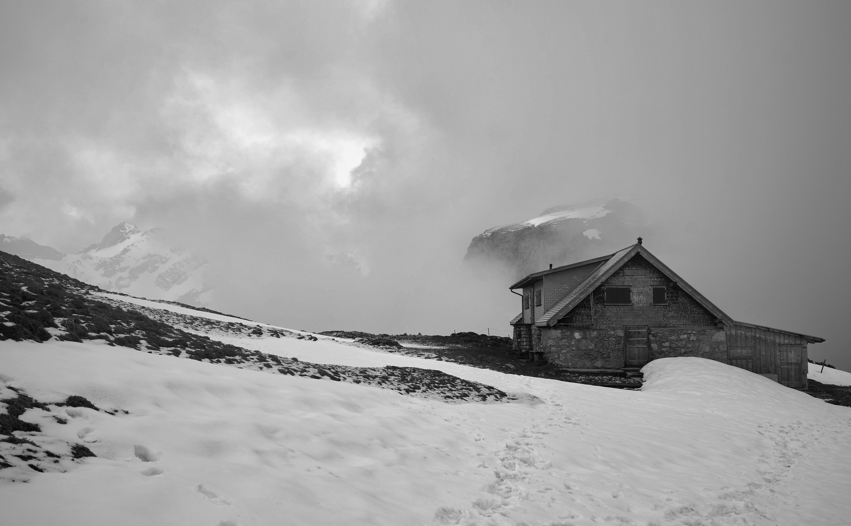 Wolken und Schnee