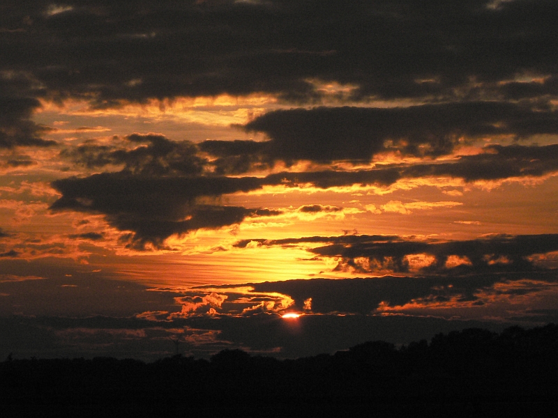 Wolken und Sonne