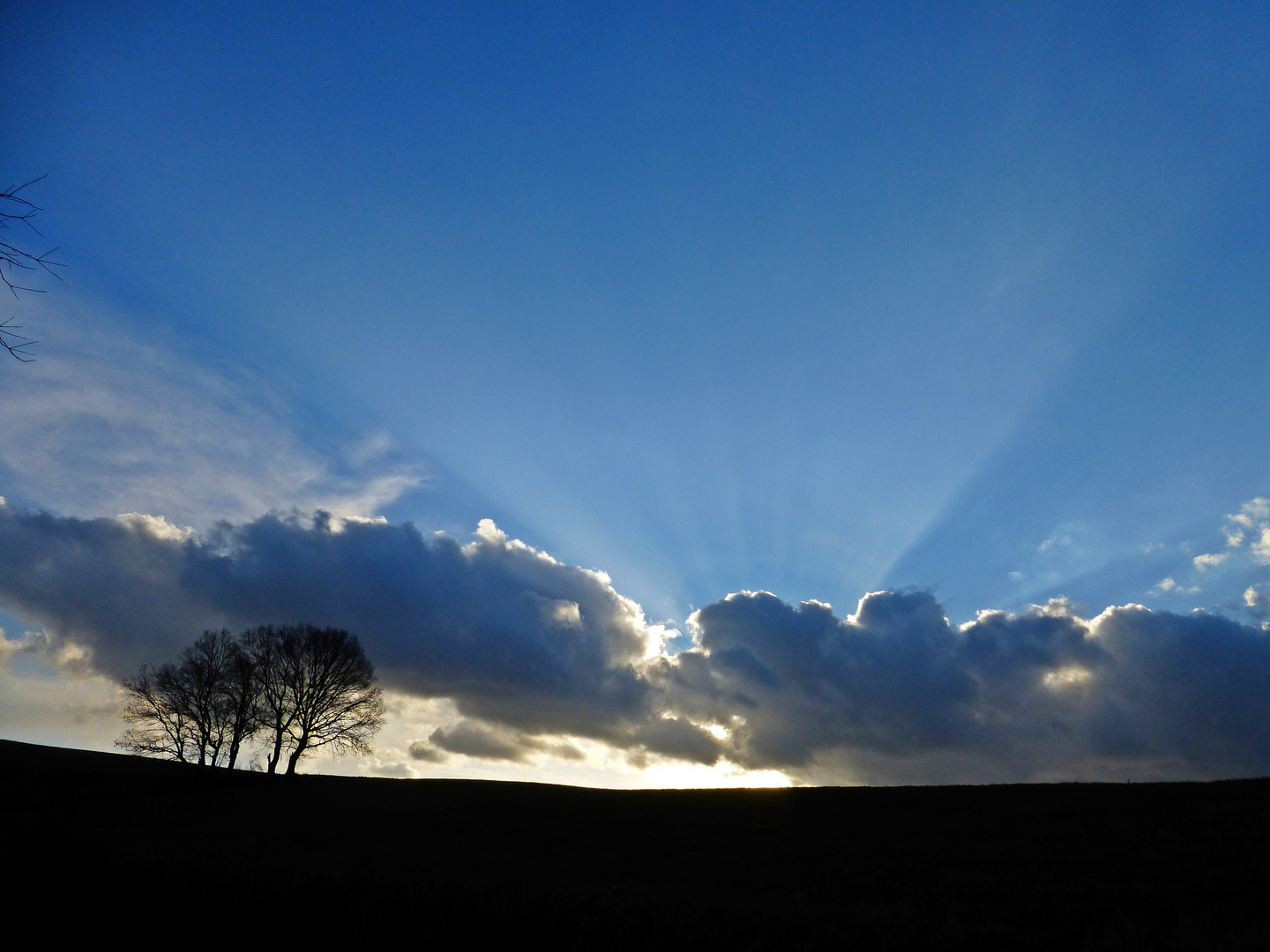 Wolken und Sonne