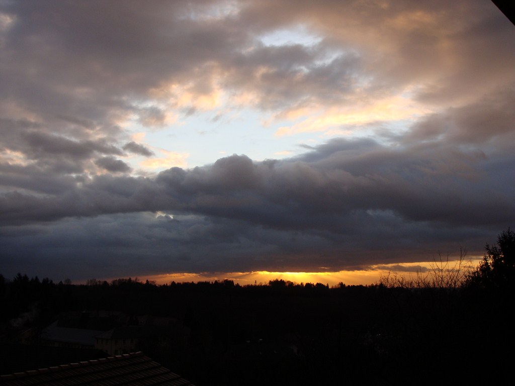 Wolken und Sonne