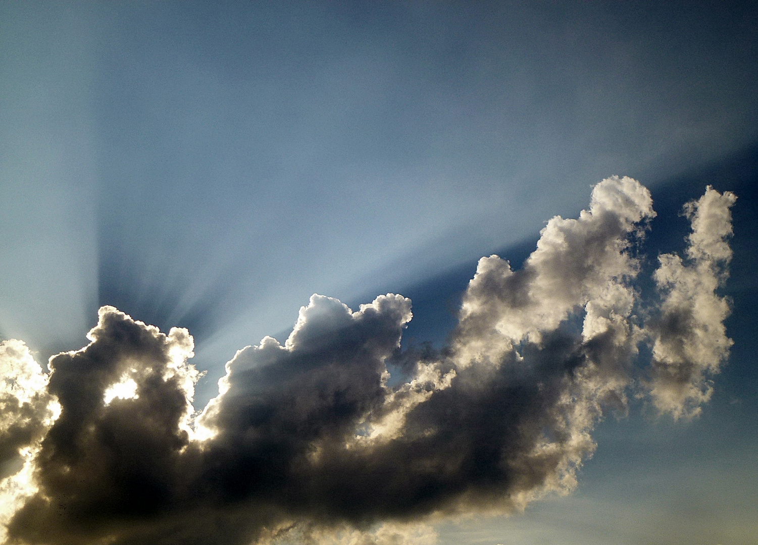 Wolken und Sonnenstrahlen 3