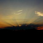 Wolken vor der untergehenden Sonne III