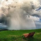 Wolkenbruch mit Regenbogen