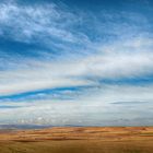 Wolkenhimmel über Steppenlandschaft