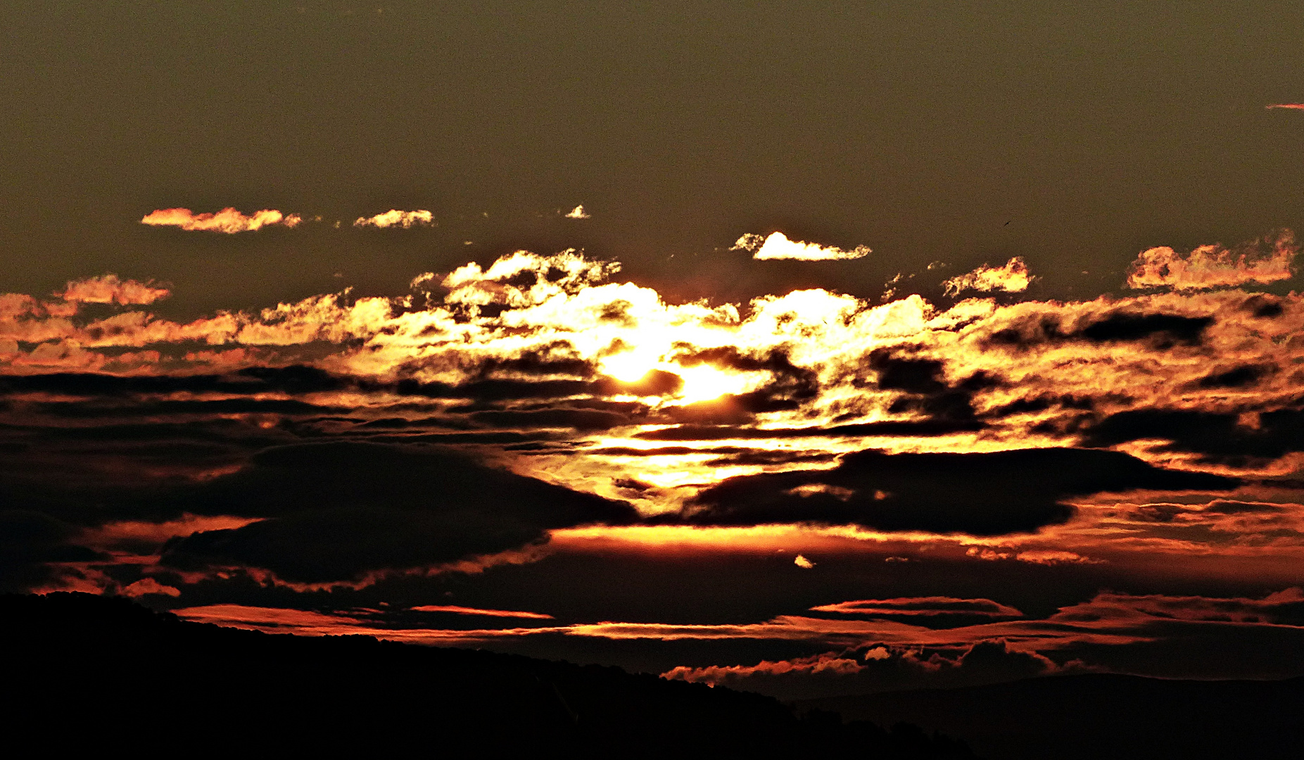 Wolkenspiel beim Sonnenaufgang