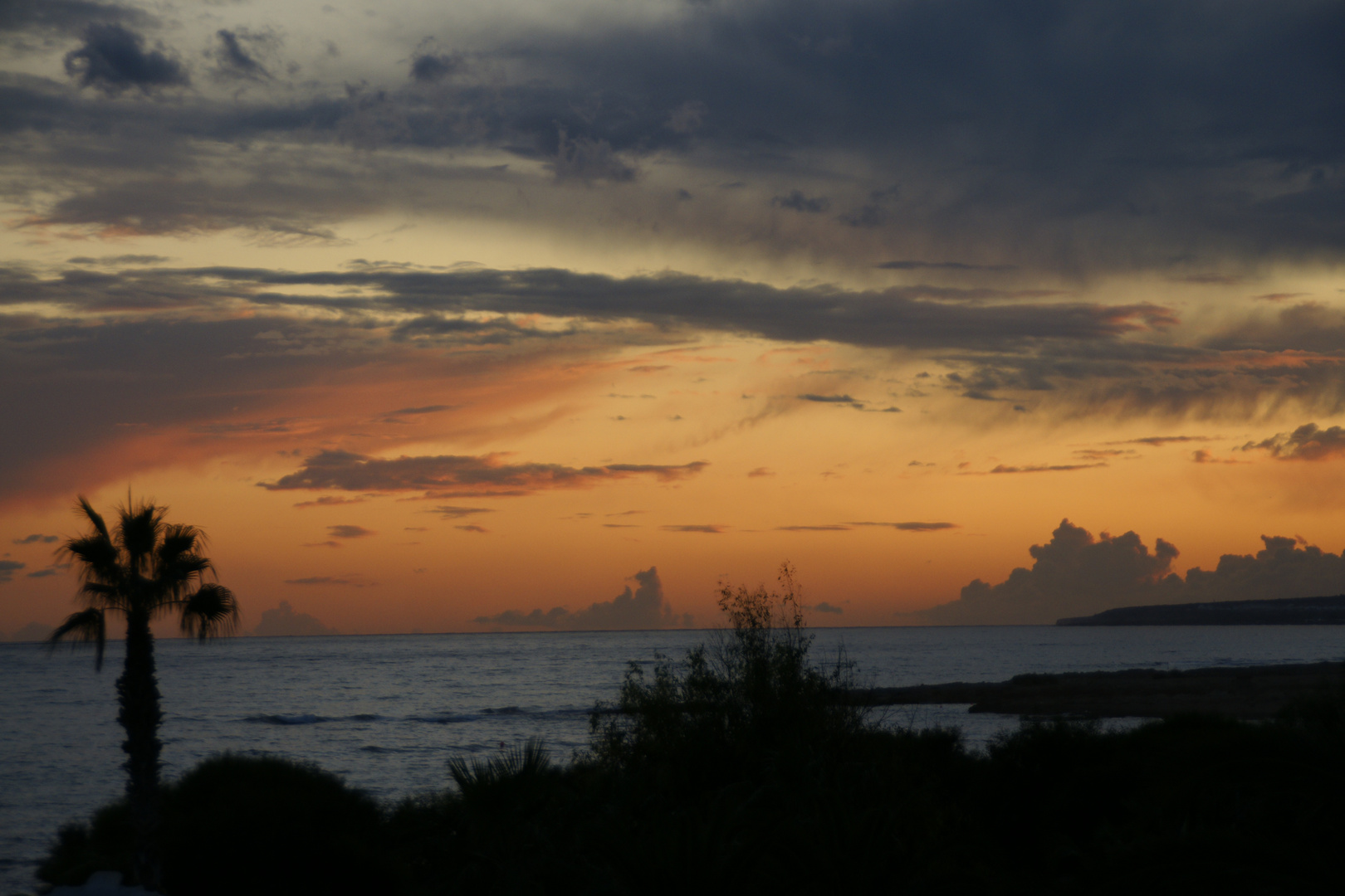 Wolkenspiel beim Sonnenuntergang