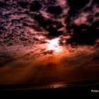 Wolkenspiele am Nordseestrand bei Ebbe in Büsum